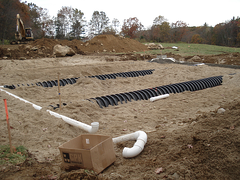 Custom home builder Southborough MA leach field drains