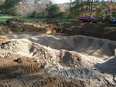 Custom home builder Southborough MA add sand to leach field
