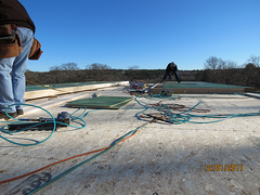 Custom home builder Southborough MA cover leach field with sand