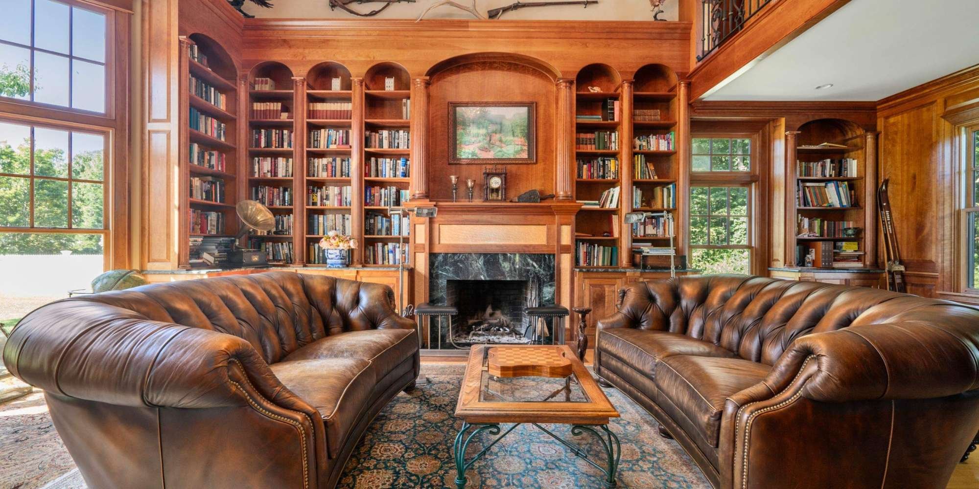 Image of a home remodel featuring a library siiting room by Gilmore Building Co. in Grafton, MA