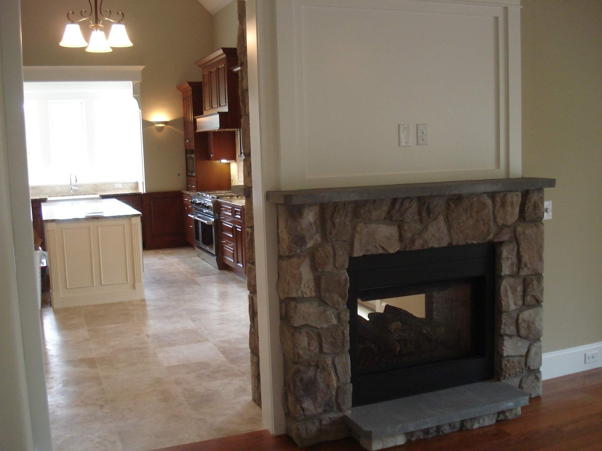 Photo of Kitchen View Past Fireplace Wall - Pre