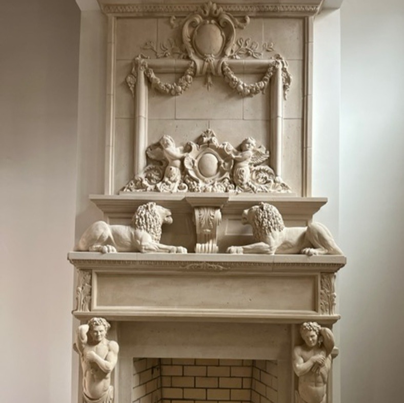 Custom Stone cast French Fireplace